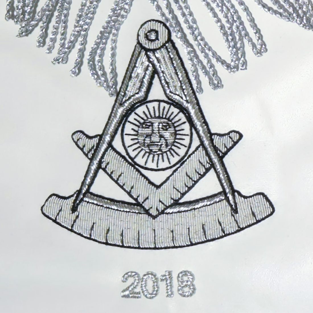 Freemason Past Master apron featuring silver bullion embroidery with black thread shading for a rich design.