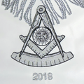 Detailed view of the silver bullion Past Master symbol on a high-quality masonic apron.